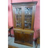 A Victorian style hardwood four door bookcase