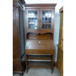 An Edward VII oak bureau bookcase