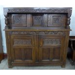 An 18th Century Welsh carved oak cwpwrdd durden