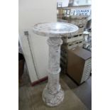 A marble pedestal,