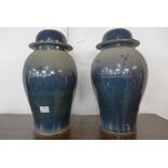 A pair of large Chinese blue ginger jars and covers