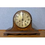 An inlaid mahogany mantel clock