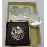 Coins; a silver Queen Victoria 1887 double florin,