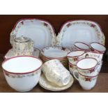 A Davenport burgundy and gilt tea service and matching Shelley tea plates and T.F.&S.