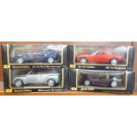 Four Maisto 1:18 scale model vehicles, Mercedes-Benz, Chevrolet,