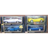 Three Maisto and one Burago 1:18 scale model vehicles, Mercedes-Benz A-Class, 1965 Pontiac GTO,