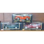 Two Maisto and one Burago 1:18 scale model vehicles, Jaguar XJ220,