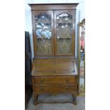 An Edward VII oak bureau bookcase