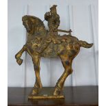 A large Chinese polychrome figure of a warrior on horseback