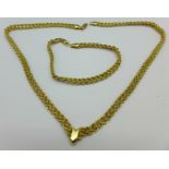 A 9ct gold necklace and matching bracelet, 10.