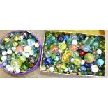 Two tins of marbles, 3.