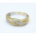 A 14ct gold ring set with approximately forty-three diamonds, 3.