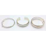 Three silver bangles