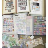 Seven albums of stamps and loose stamps