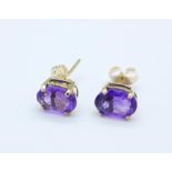 A pair of 9ct gold and amethyst earrings