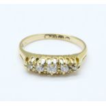 An 18ct gold, five stone diamond ring, 1.