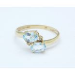 A 9ct gold and blue stone ring, 1.