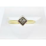 An 18ct gold and diamond ring, 2g,