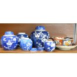 An Imari bowl, a/f, an Imari dish and five jars with four lids,