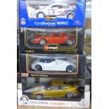 Four 1:18 scale model vehicles; two Burago, one Autostart and Maisto, Ferrari 250 Le Mans,