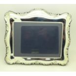 A silver photograph frame by Carrs,