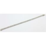 An 18ct white gold and diamond tennis bracelet, set with forty-two diamonds, each approximately 0.