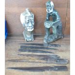 Two carved tribal figures and six carved hardwood letter openers