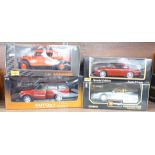 Four 1:18 scale model vehicles; two Maisto, Burago and Auto Art, Ferrari 550, Porsche 911,