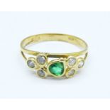 An 18ct gold, green and white stone set ring, 1.