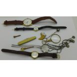 Three wristwatches including a lady's Tissot, an eyepiece, small button hook, a hat pin, etc.