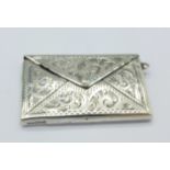 A silver double stamp case,