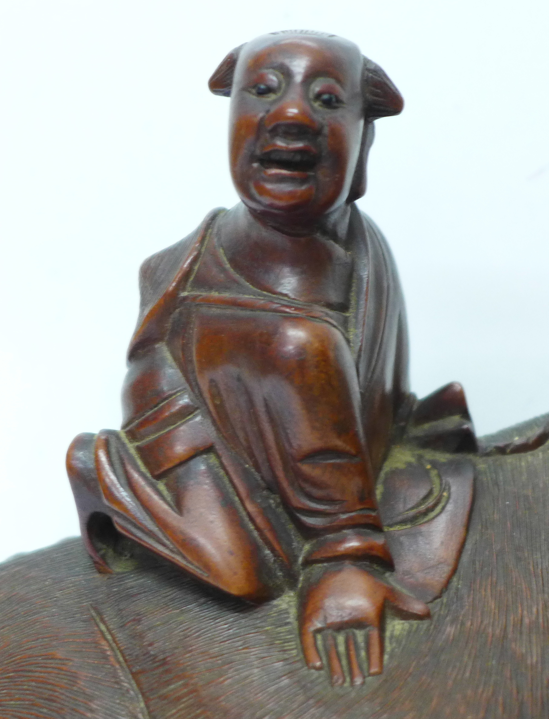 A 19th Century carved oriental wooden figure, boy with water buffalo, - Image 3 of 10