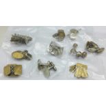 Ten pairs of silver cufflinks