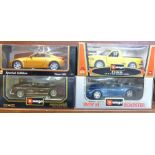 Four 1:18 scale model vehicles; three Burago and a Maisto, Mercedes-Benz 300SL, BMW M Roadster,