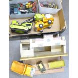 Die-cast vehicles, including three Tonka toys, Dinky Toys Centurion tank,