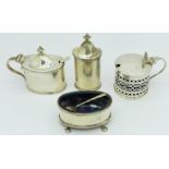 A set of three silver condiments and a Victorian silver mustard,