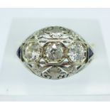 An 18ct white gold, Art Deco diamond and sapphire ring,
