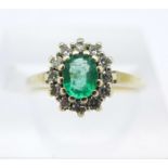 A 9ct gold, emerald and white stone cluster ring, 2.