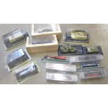 Six plastic model trains in bubble packs,