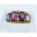 A 9ct gold and four coloured stone ring, 3.