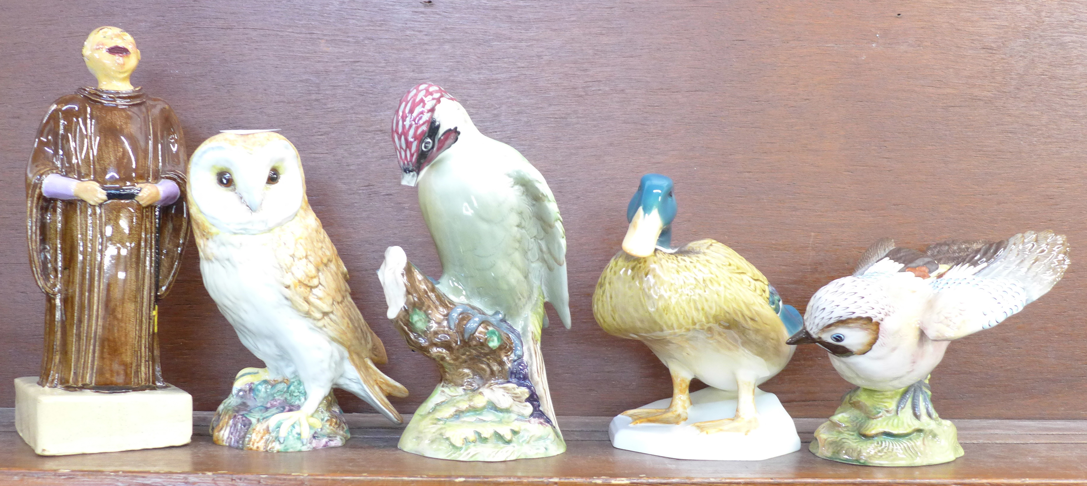 A large Beswick figure of a jay, 1219, duck, 817, barn owl, 1046 and woodpecker, 1218,