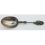 A Dutch silver christening spoon with punch marks,