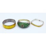 Three silver and enamel rings