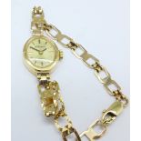 A lady's 9ct gold wristwatch, total weight with movement 8.