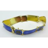 A Norwegian silver gilt and blue enamel bracelet with finely detailed panels, 18cm long,