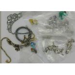 Ten pairs of vintage clip-on earrings and diamante jewellery