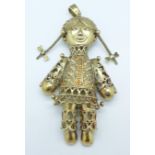 A large silver gilt rag doll pendant, 36g, 8.