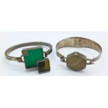 A hallmarked silver and agate bangle and one other bangle set with two square coloured glass