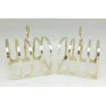 Two silver toast racks,