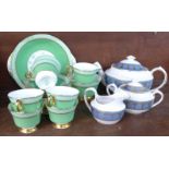 An Adderley fine bone china six setting tea set with cream, sugar and cake plate,